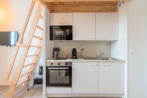Η κουζίνα ή μικρή κουζίνα στο Studio pour deux personnes en mezzanine