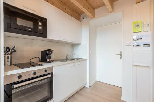 Η κουζίνα ή μικρή κουζίνα στο Studio pour deux personnes en mezzanine