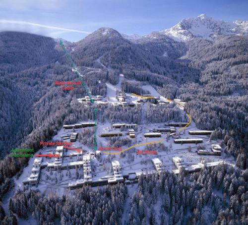 an aerial view of a ski resort in the mountains at Panorama Marilleva 1400 - Val di Sole in Marilleva