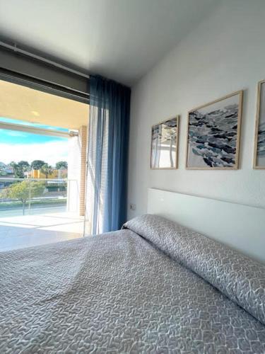 En eller flere senge i et værelse på Apartamento Boutique Jardines