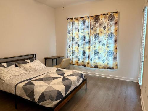 a bedroom with a bed and a window at Stylish 1BR Home Leander TX near Austin in Leander