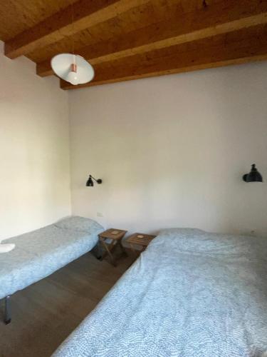 Postel nebo postele na pokoji v ubytování Frente a los Picos de Europa