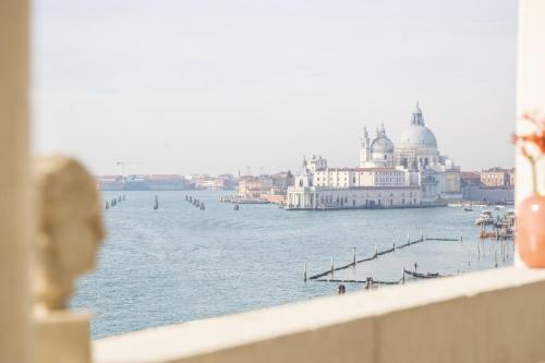 a view of a body of water with a building at Londra Palace Venezia in Venice