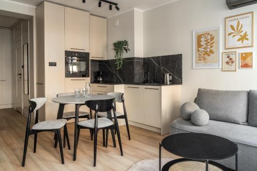 Kuchyňa alebo kuchynka v ubytovaní RentPlanet - Apartament Szczytnicka