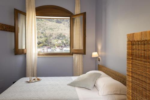 Una cama o camas en una habitación de Hotel Cetarium