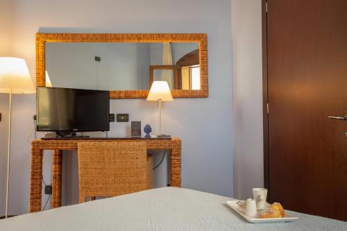 Una cama o camas en una habitación de Hotel Cetarium