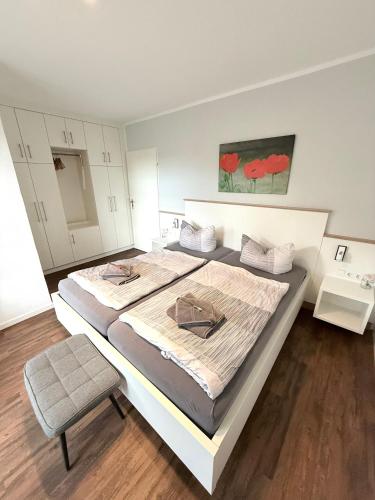 Katil atau katil-katil dalam bilik di Hotel garni Seeluft Büsum