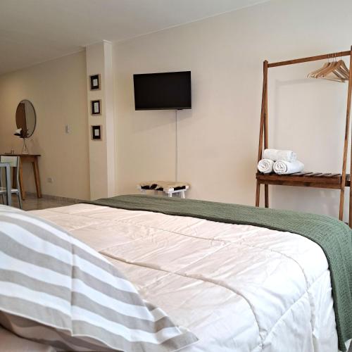 Giường trong phòng chung tại Apartamento Caseros