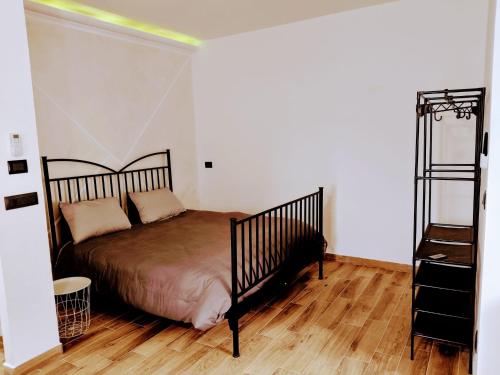 Giường trong phòng chung tại Casa Antonelli