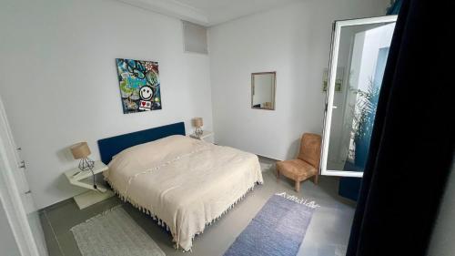 Ένα ή περισσότερα κρεβάτια σε δωμάτιο στο Jasmine House Sidi Bou Saïd