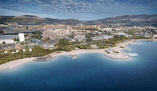 an aerial view of a beach and a city at Apartment JASS next to MALL OF SPLIT in Split