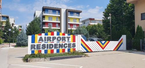 a sign that reads airport reserves in front of a building at Airport Residence in Otopeni
