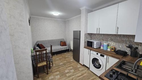 Kuchyň nebo kuchyňský kout v ubytování Apartment Oxalis