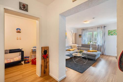 a living room with a couch and a table at Ferienwohnung Gaby Lehmann in Hornberg