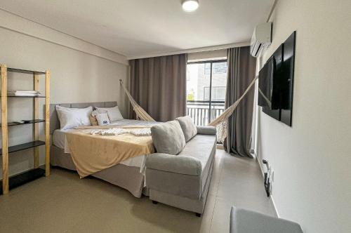 Postel nebo postele na pokoji v ubytování Quartz Intermares Studios 150m Praia By DM Apartments
