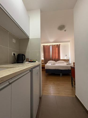 Ένα ή περισσότερα κρεβάτια σε δωμάτιο στο Soho Eilat