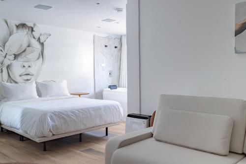 Ένα ή περισσότερα κρεβάτια σε δωμάτιο στο Up Hotel Boutique