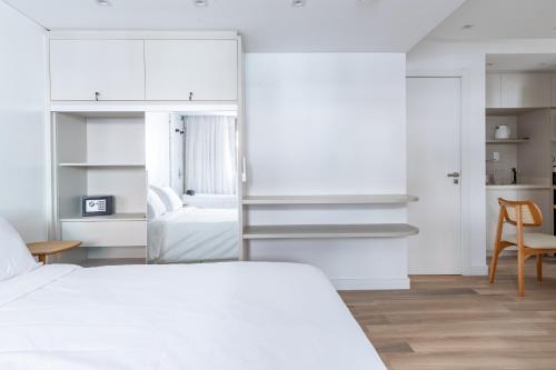 Ένα ή περισσότερα κρεβάτια σε δωμάτιο στο Up Hotel Boutique