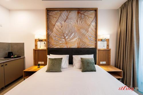 En eller flere senge i et værelse på El Doris Boutique Living St Julian's