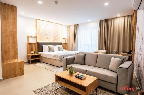 En eller flere senge i et værelse på El Doris Boutique Living St Julian's