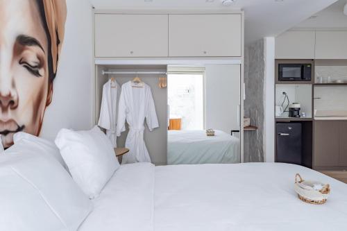 Ένα ή περισσότερα κρεβάτια σε δωμάτιο στο Up Hotel Boutique