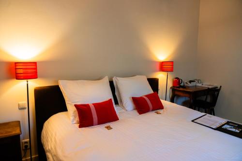 Cama o camas de una habitación en B&B Het Wellnest