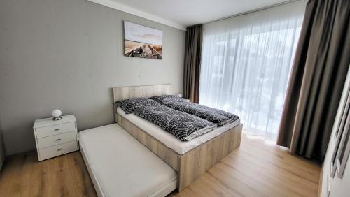 Postel nebo postele na pokoji v ubytování Brezovina B208 Oravské Veselé - ORAVA