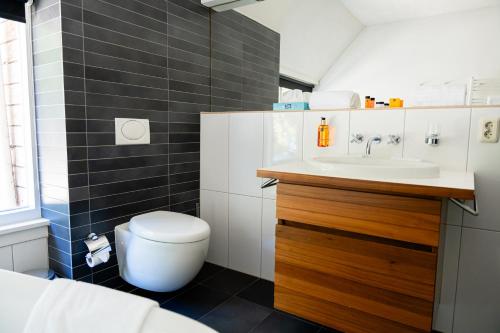 Un baño de B&B Het Wellnest