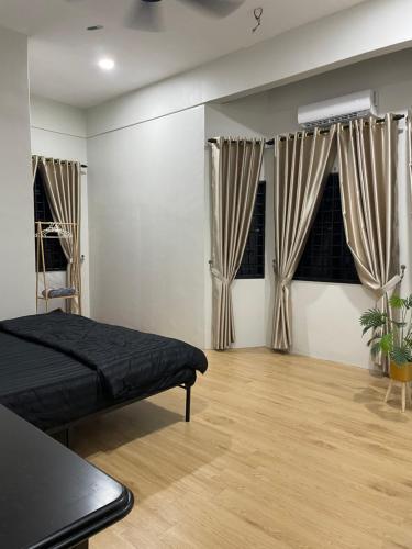 Ένα ή περισσότερα κρεβάτια σε δωμάτιο στο Homestay Ayah