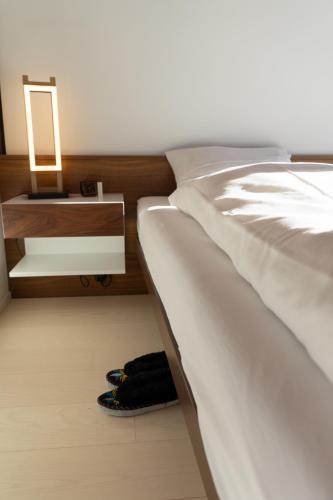 Una cama o camas en una habitación de Alpstern