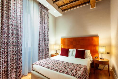 Postel nebo postele na pokoji v ubytování Hotel Delle Nazioni