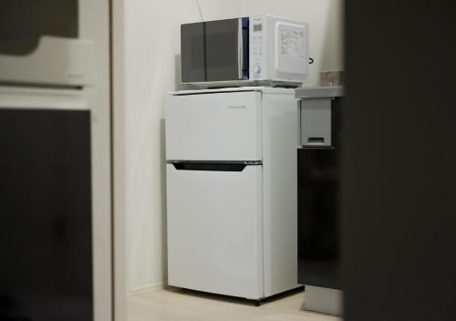 Η κουζίνα ή μικρή κουζίνα στο Room near Korea Town and Osaka Expo
