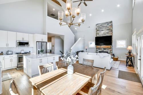 a kitchen and living room with a table and chairs at Newly Built Home with Mtn Views in Black Mountain! in Black Mountain