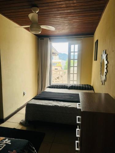 Katil atau katil-katil dalam bilik di Recreio Guest House