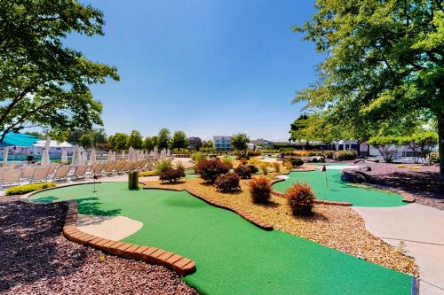 a miniature golf course at a resort with a putting green at The Peninsula --- 27606 S Nicklaus Ave in Millsboro