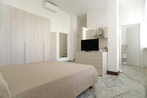 Ένα ή περισσότερα κρεβάτια σε δωμάτιο στο Casa Damiano