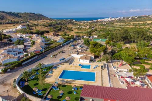 an aerial view of a resort with a swimming pool at Parque de Campismo Orbitur Valverde in Luz