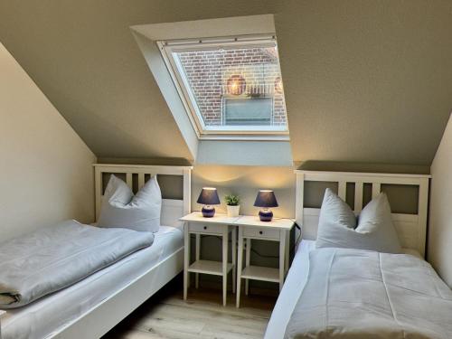 Voodi või voodid majutusasutuse Haus Meerzeit - Altfunixsiel toas