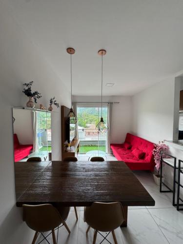 Χώρος καθιστικού στο Apartamento vista montanha