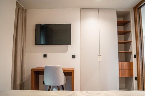 TV a/nebo společenská místnost v ubytování Miradouro do Vale - Apartamentos