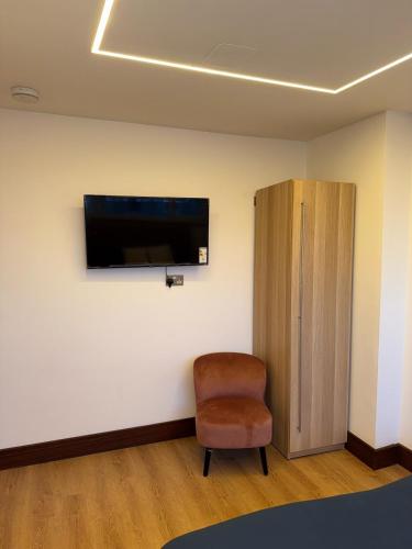 TV a/nebo společenská místnost v ubytování M16 Deluxe Apartment - 4