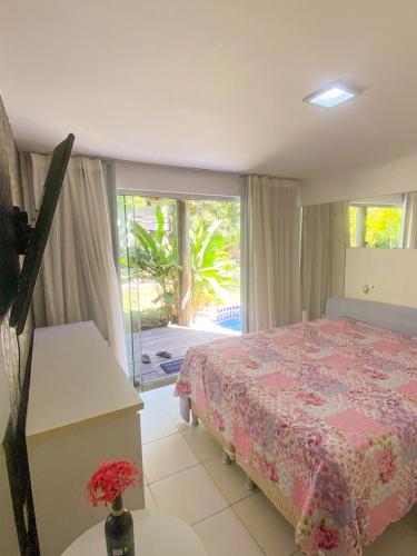 Postel nebo postele na pokoji v ubytování Quarto e sala com piscina em Maceió - Villas Tulipa 02
