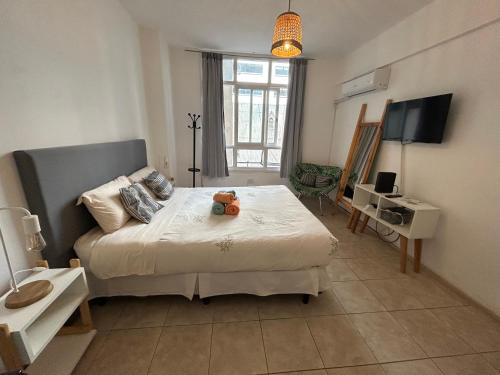 Postel nebo postele na pokoji v ubytování Maipu Apartment Studio