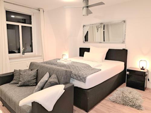 Ένα ή περισσότερα κρεβάτια σε δωμάτιο στο Enjoy Dresden Appartement