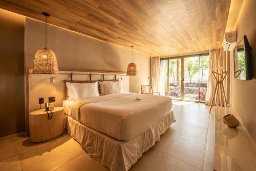 Postel nebo postele na pokoji v ubytování Hamares Boutique Hotel
