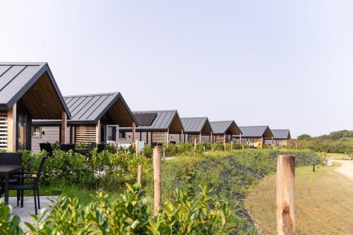 a row of lodges at a resort at Berg Lodge in Valkenburg