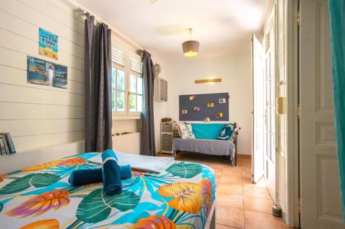 Postel nebo postele na pokoji v ubytování Charmant bungalow avec jardin au Vauclin