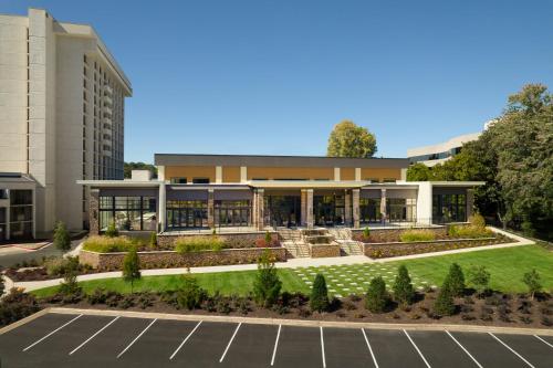 an empty parking lot in front of a building at SpringHill Suites by Marriott Atlanta Northwest in Atlanta