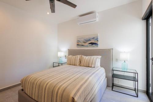 Ένα ή περισσότερα κρεβάτια σε δωμάτιο στο Cerritos Surf Residences