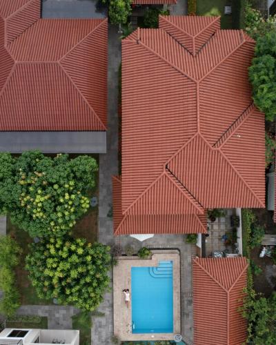 an overhead view of a house with a red roof at TIKA Casa Jardín & Suites - Suite 1 in Machala
